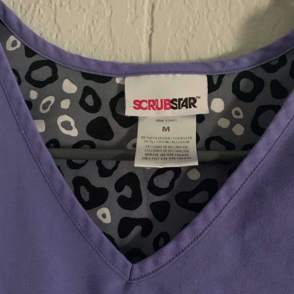 Purple M scrub top.